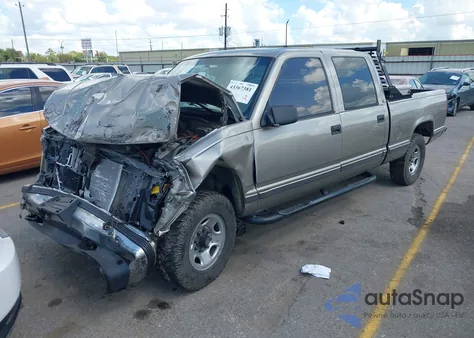 1999 Chevrolet C2500 z USA, uszkodzony, nr VIN 1GCGC23R0XF038900